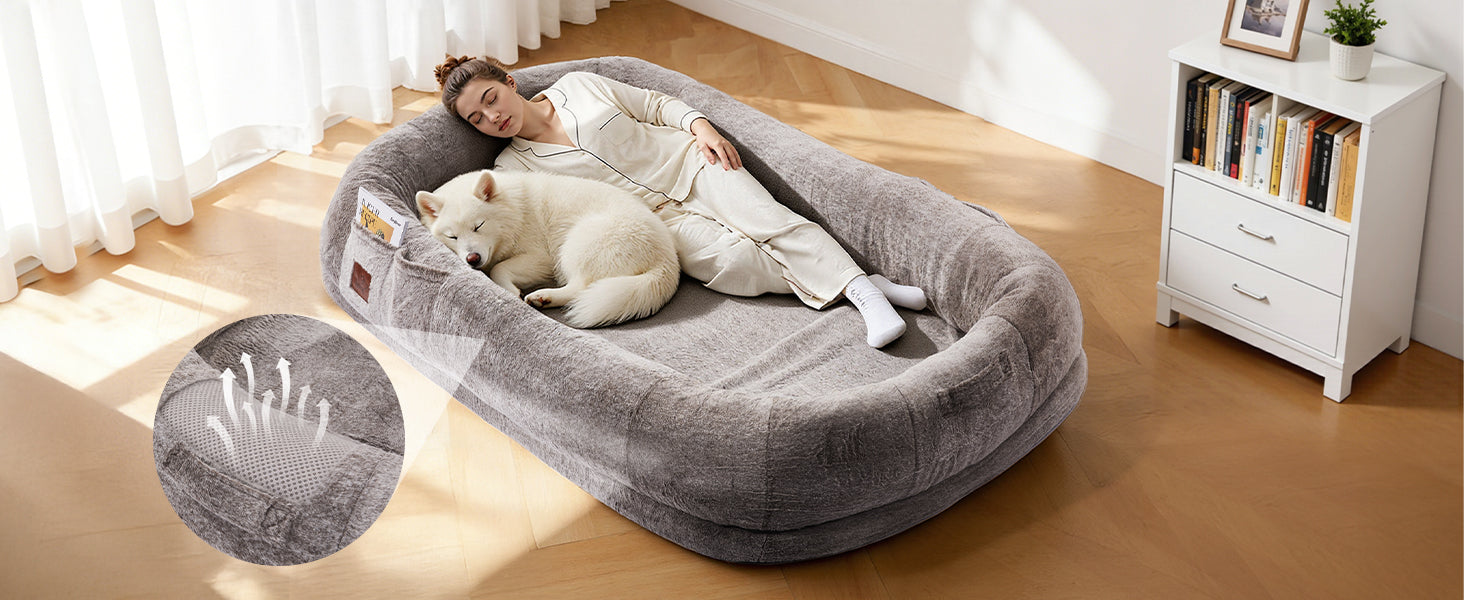 adult and dog resting together on Palnests extra large human dog bed
